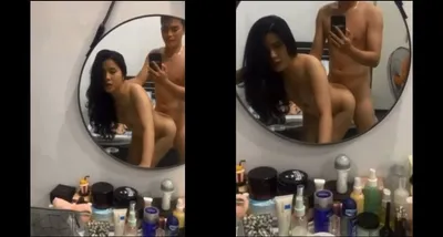 Phang nữ học sinh xinh như hoa trước gương